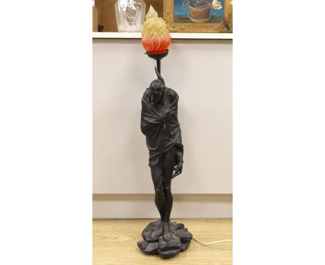 A signed J Gautier spelter table lamp, Mefisto, with flame glass shade, 102cm high