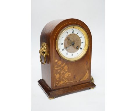 An Edwardian mahogany mantel clock, French movement striking on a coiled gong, 25cm high