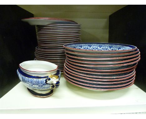 A collection of Royal Worcester dinnerware in Royal Lily pattern comprising 13 dinner plates, 14 side plates, 12 soup dishes 
