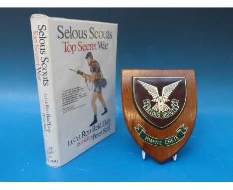 Selous Scouts Top Secret War by Lt. Col. Ron Reid Daly together with a regimental 'Selous Scouts, Pamwe Chete' plaque dated 1