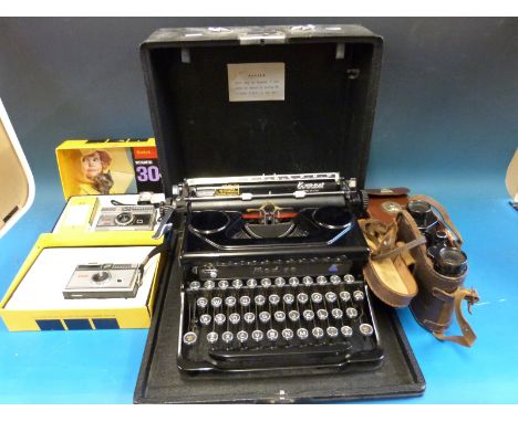 A pair of "Lumina" binoculars, an "Ikonta" bellows camera and two Instamatic cameras in original boxes, together with a vinta