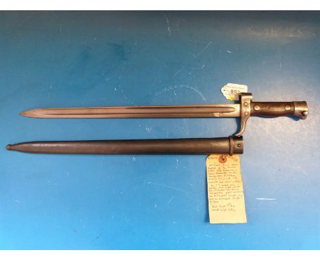 A French M92 Sabre bayonet with 1915 modified guillon, blade length 39.6cm in metal scabbard