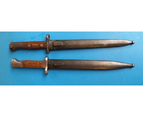 Two WW1 unmarked but Wilkinson type bayonets, 25cm length blades 20892 on one hilt, the other stamped 2945