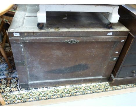 A large vintage travelling or storage trunk 