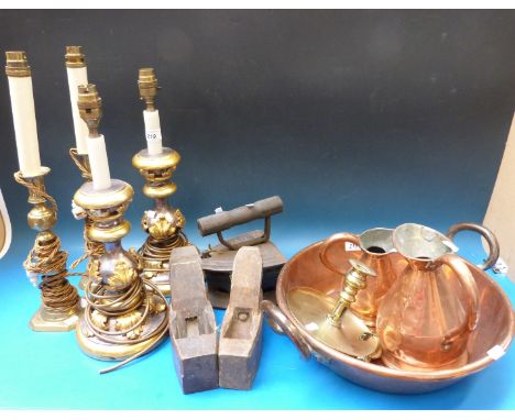 A quantity of metalware to include copper bowl, candlestick, lamps etc