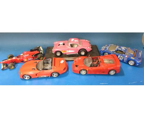 Twenty-two mainly Burago and Maistro 1:18 scale diecast model vehicles