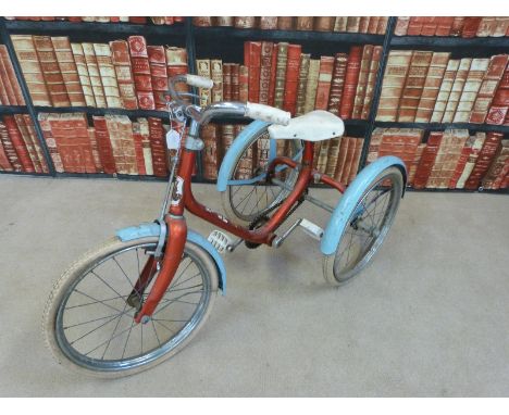 A vintage childs Raleigh tricycle