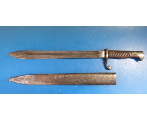 A WWI German 'butcher's blade' bayonet by F Reurt, W15 to spine, blade length 36.6cm, in metal scabbard