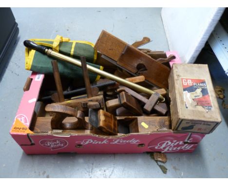 A quantity of vintage woodworking tools to include plough and other planes, squares etc