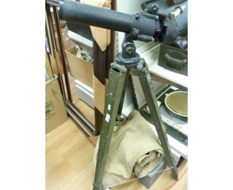 A cased Canadian Kodak 7x50 gun sighting telescope together with aluminium tripod mount in canvas bag