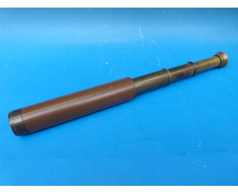 A brass and leather three draw telescope marked Broadhurst Clarkson & Co Ltd, 63 Farringdon Rd, London EC