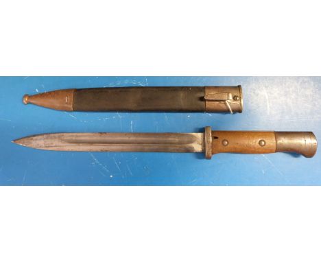 A WWI German bayonet and scabbard, the blade stamped Walter & Co Muhlhausen in Thr and F Herder A Sn Solingen  15U.5.233 to h