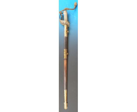 A George VI naval sword by Wilkinson with fouled anchor cipher, shagreen grip and original lanyard