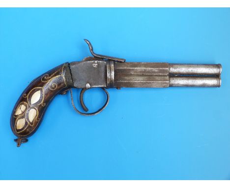 A Turkish over and under percussion pistol with mother of pearl and brass wirework inlay to the grips, circa 1840. 
