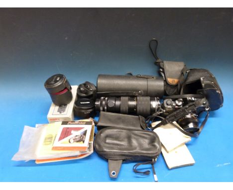 A Konica Autoflex T3 camera, Konica Zoom Hexanon AR80 - 200mm F3 5 lens, further lenses and accessories and an Olympus-Pen ca