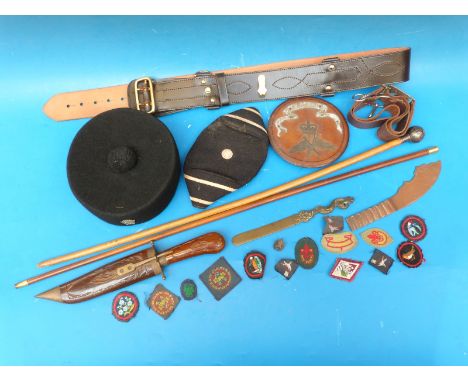 A Royal Berkshire Regiment hallmarked silver-topped swagger stick, another swagger stick, Sam Brown belt, a WW1 Nadia plaque 