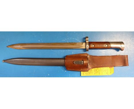 A Czech VZ-24 bayonet and scabbard 46 stamped on frog stud for year of manufacturer, completed with leather belt hanger 