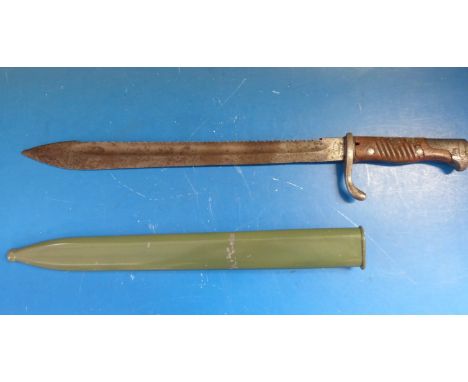 A WWI German saw back blade bayonet by Weyersberg & Co, Solingen W17 to spine the 'butcher's' shaped blade 36.7cm in length i