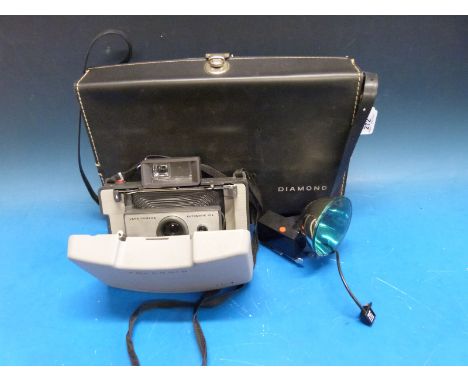 Polaroid Automatic 104 camera in 'Diamond' carrying case complete with flash and instructions