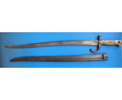 A French bayonet dated 1873 and stamped P86953 with scabbard stamped P84771