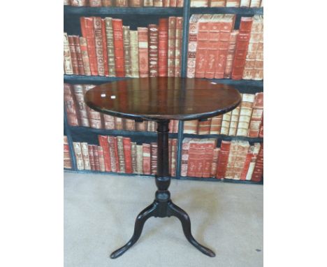 An 18th/19thC mahogany tilt top table raised on slender tripod base, diameter 50cm