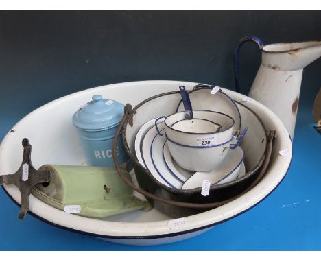 A collection of vintage enamel kitchenalia including child's bath/large basin 
