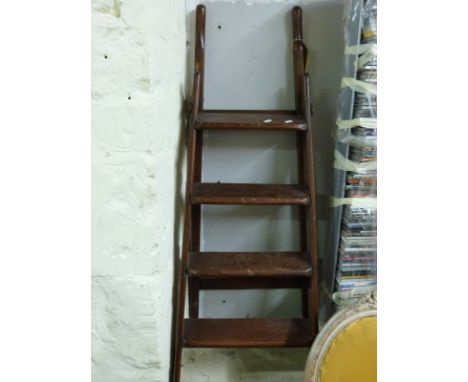 A mahogany folding library step ladder