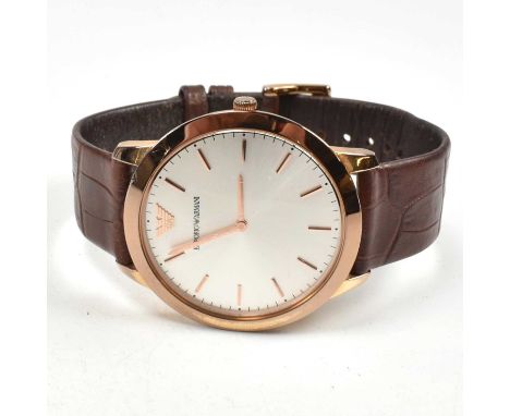 A contemporary Emporio Armani gentleman's wristwatch. Rose gold coloured case with champagne dial, baton markers with logo at