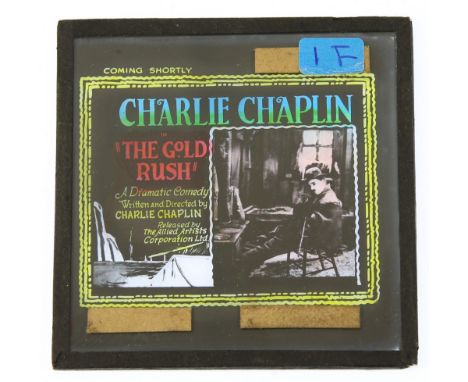 60+ Vintage Glass slides used for advertising, many colour including Charlie Chaplin The Gold Rush, Rookies, Hired Wife, Figh