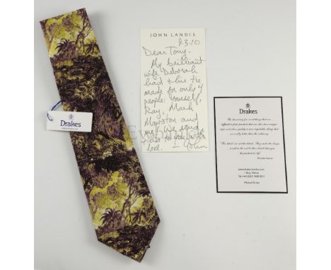 Drake's of London - Specially made tie with Prehistoric Jungle scene print, with a handwritten note from John Landis, ' 9.3.1
