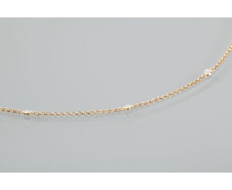 DIAMOND SET CHAIN BRACELET
the chain interspersed with six brilliant cut diamonds, marked 14k, 25cm long