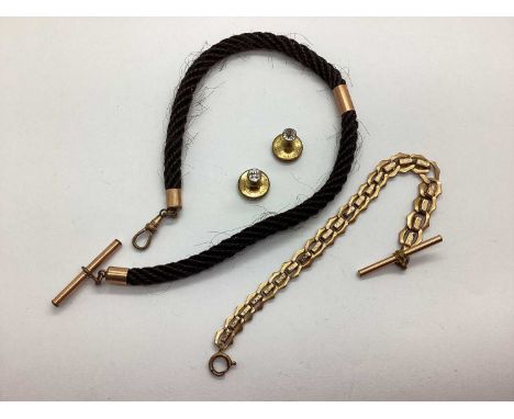 A Victorian Mourning Plaited Hair Watch Chain, suspending T-bar and swivel style clasp, gilted panel to centre, together with