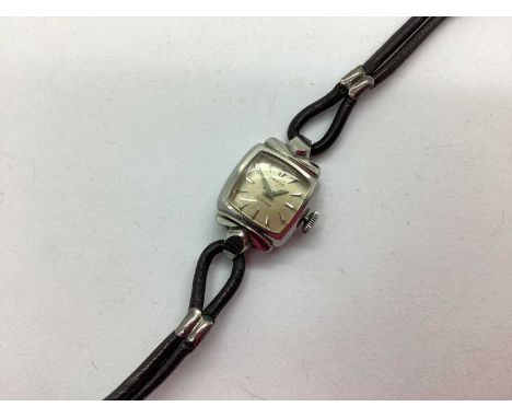 Omega; A Turler Art Deco Style Ladies Wristwatch, the signed dial with arrow markers in a stylised cushion case, inner case b