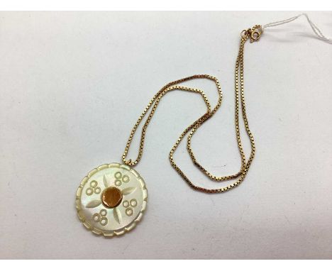 A 9ct Gold Box Link Chain, (London import mark), suspending a mother of pearl circular panel pendant, with carved detailing a