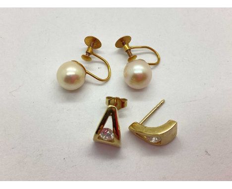 A Pair of Freshwater Pearl Bead Clip On Earrings, the pearls to screw backs stamped "9ct", together with a pair of modern sto