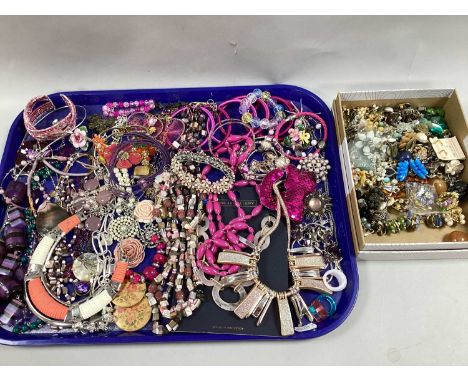 An Assortment of Modern Costume Jewellery, in hues of pink and mauve, including bangles, gilt coloured necklace, heartshape d