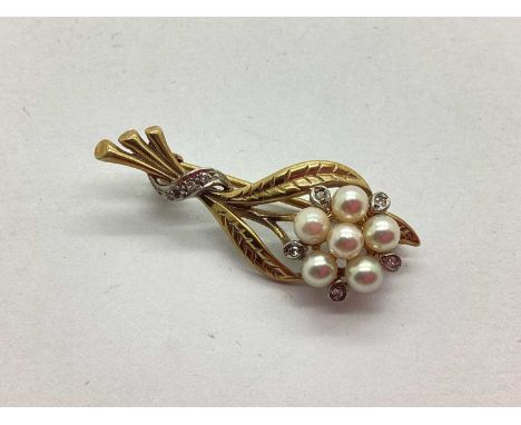 A 9ct Gold Freshwater Pearl Bead and Diamond Set Floral Spray Brooch, the pearl beads of blush hue, set within brilliant cut 