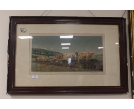 A FRAMED AND GLAZED COLOURED PRINT OF OXEN PLOUGHING