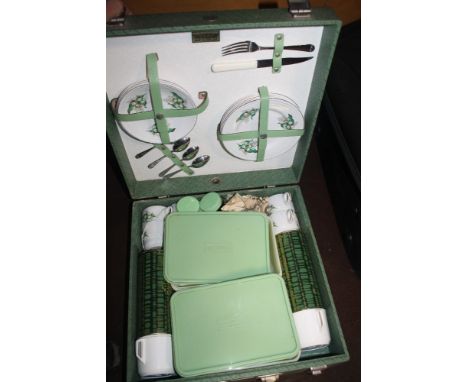 A VINTAGE BREXTON PICNIC HAMPER AND CONTENTS  
