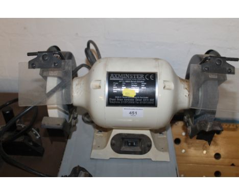 A DOUBLE BENCH GRINDER WITH TWO WORK BENCHES 