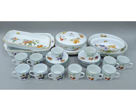 A quantity of Royal Worcester Evesham and Evesham Vale pattern tea and dinnerwares. The tureen 27 cm diameter.