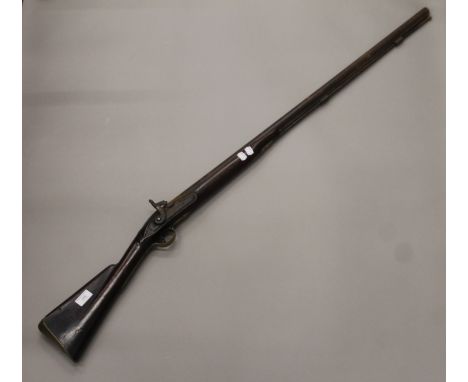 A 19th century percussion musket. 139 cm long.