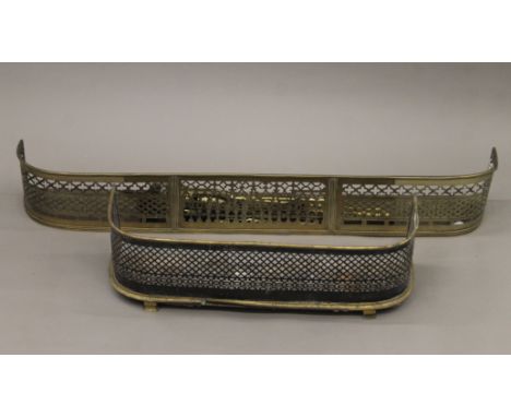 Two 19th century brass fenders and a quantity of fire irons etc. The larger fender 130 cm.