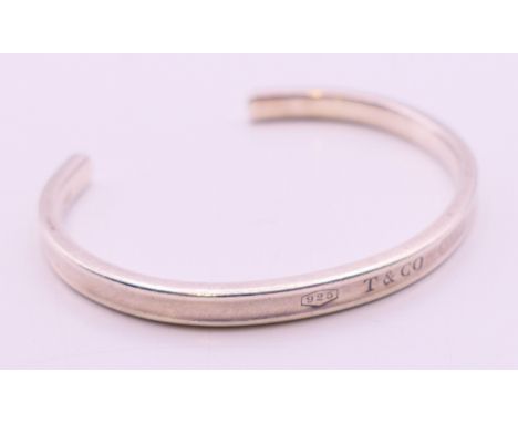 A silver Tiffany & Co 1837 design cuff bangle. 5.5 cm inner diameter.