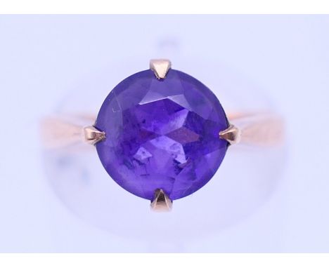 A 9 ct gold and amethyst ring. Ring size L. 