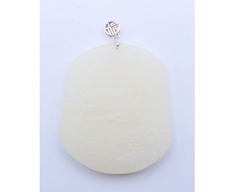 A silver-topped white jade pendant.  6 cm high including suspension loop.