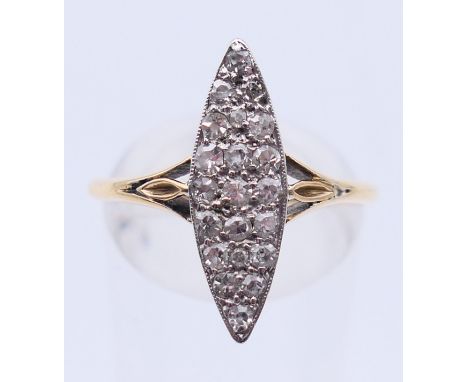 An 18 ct gold diamond navette ring. Ring size Q.