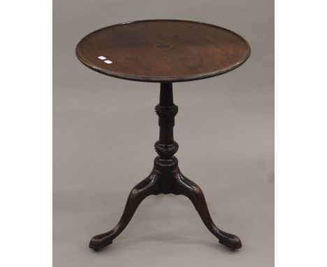 A 19th century mahogany tilt-top  tripod table. 56 cm diameter.