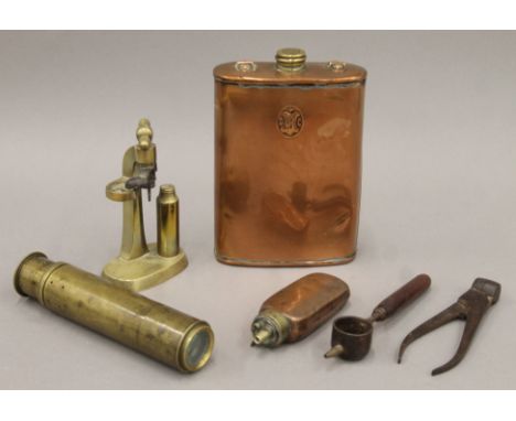 A quantity of various gun-related equipment etc including bullet moulds and a telescope. The latter 17 cm long.