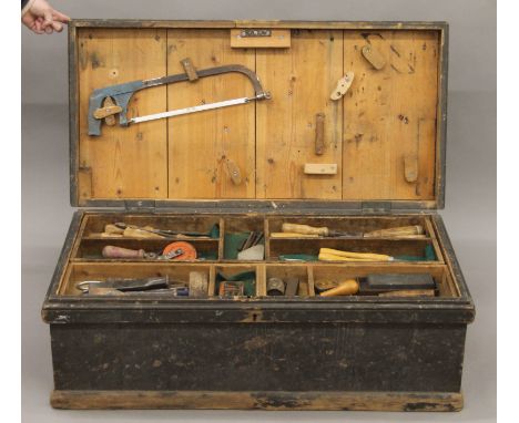 A Victorian tool box containing a large quantity of tools. 95 cm wide.